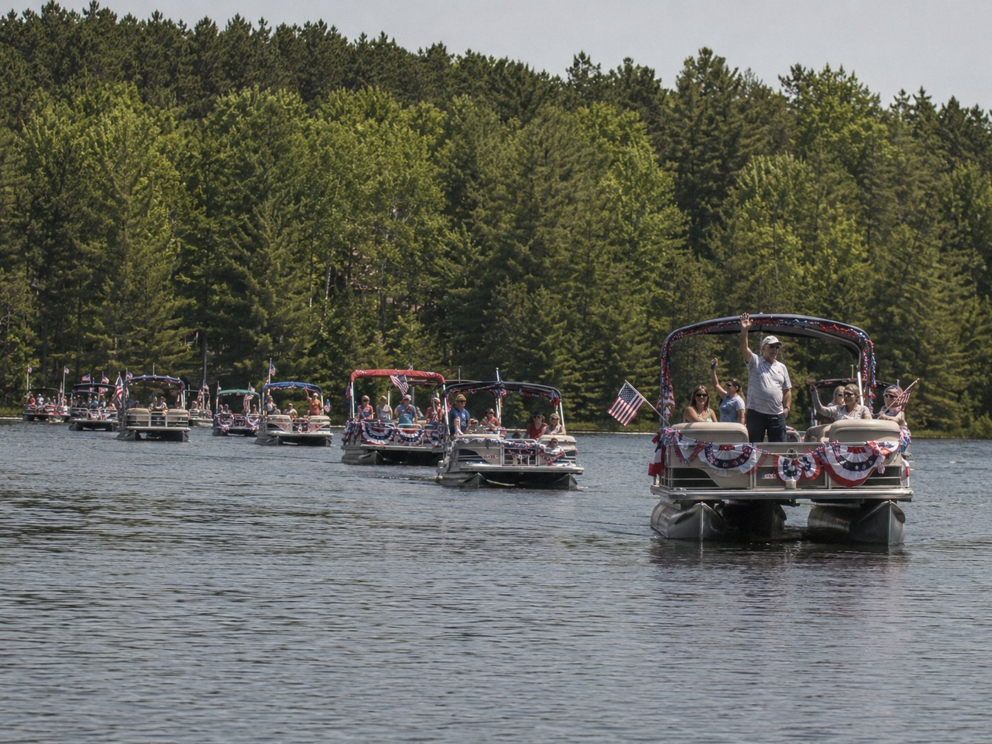 First “Official” Boat Parade Replaces the Conga Line; Big Pelican Survives the Formality photo