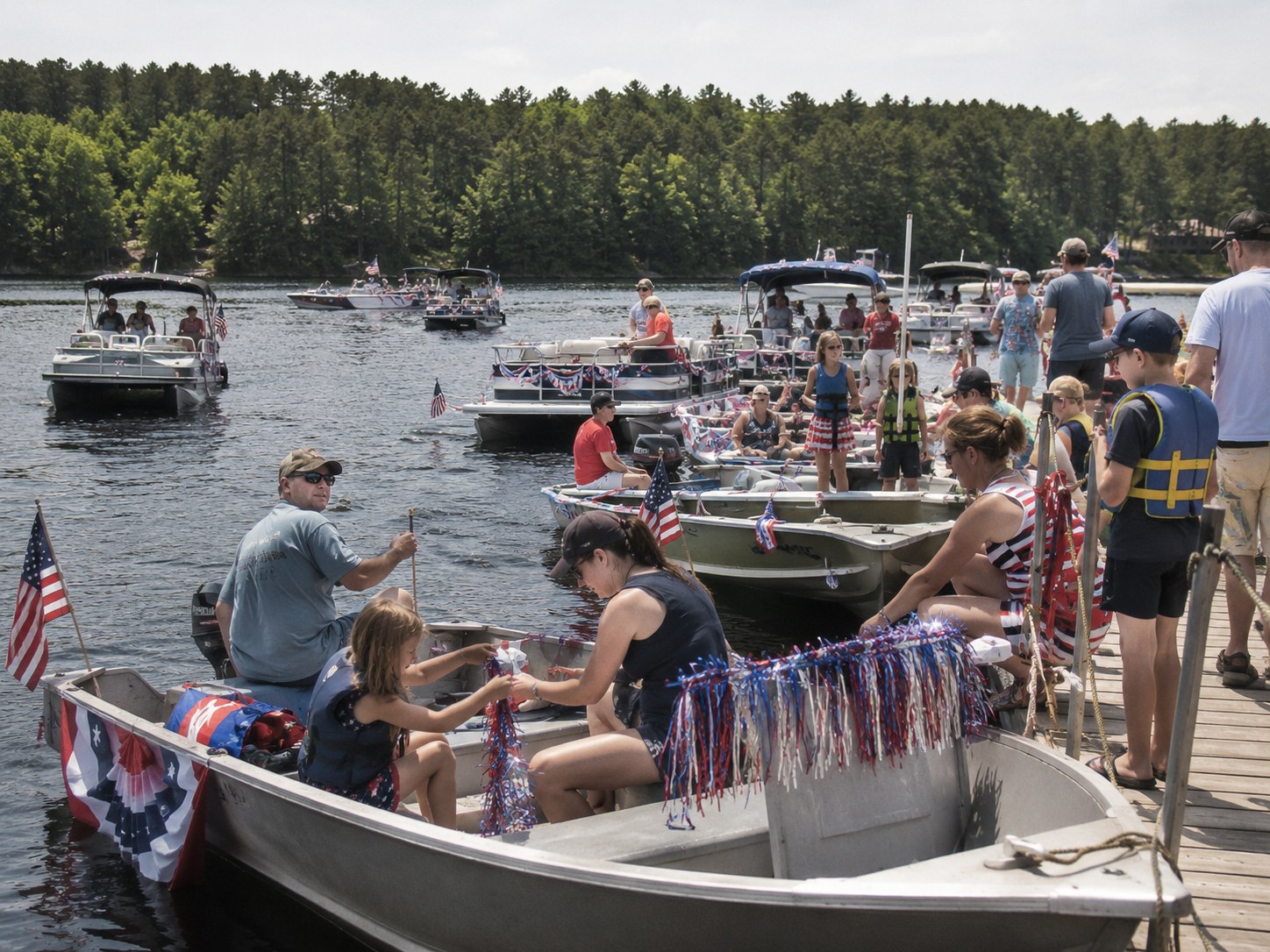 Misquah Puts a Parade on the Water; the First Fourth of July Flotilla Sets Out Saturday photo