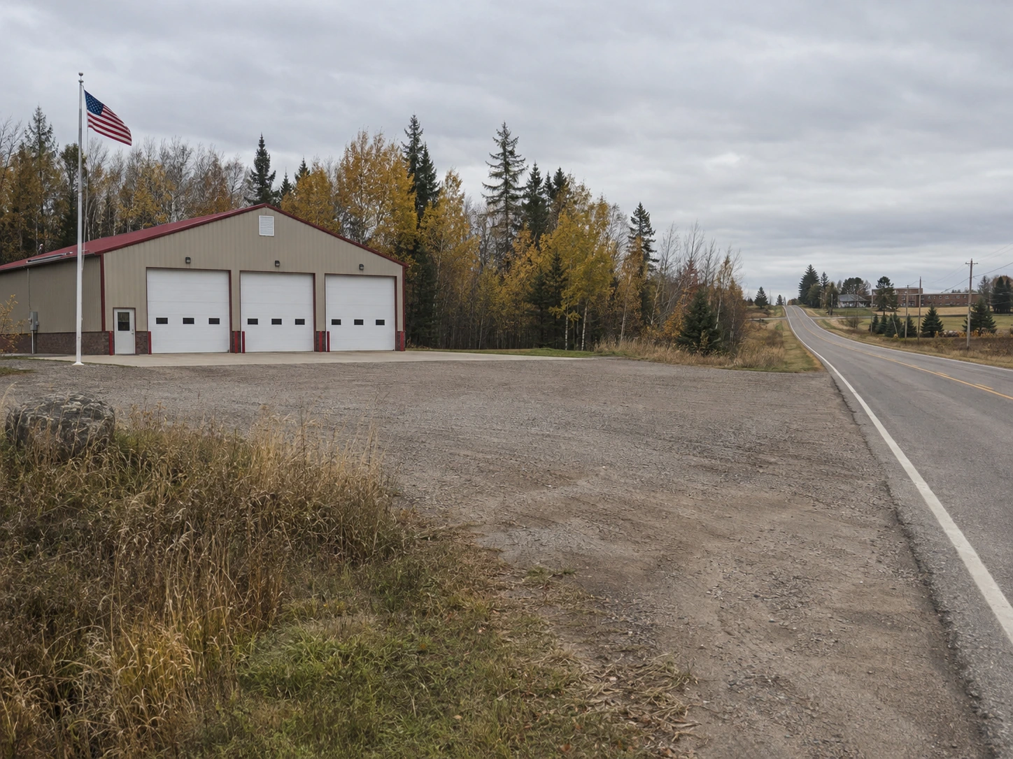 The fire hall and gravel apron where Friday's homecoming parade will unload.